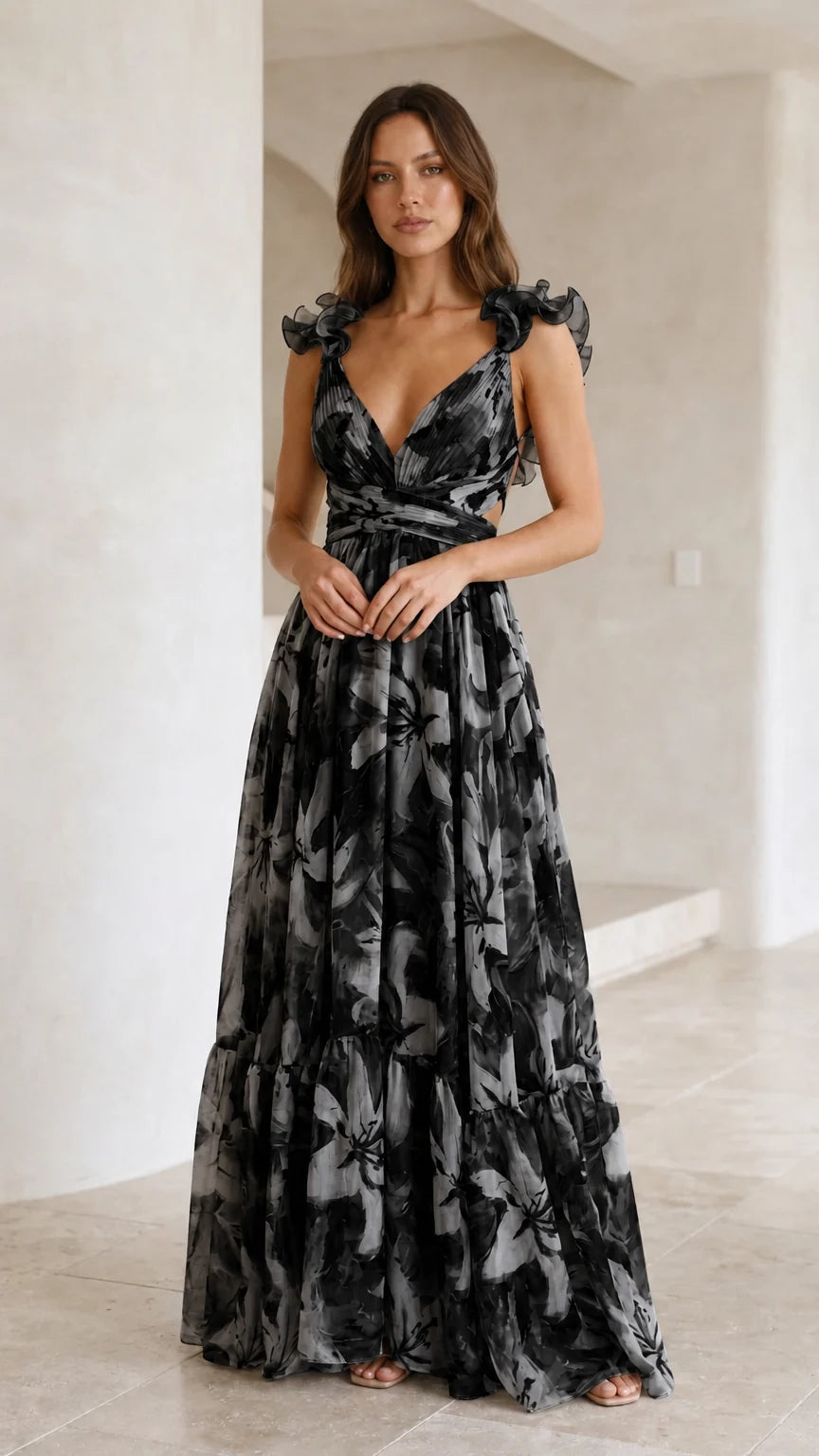 Front view of woman wearing black and grey floral print maxi dress