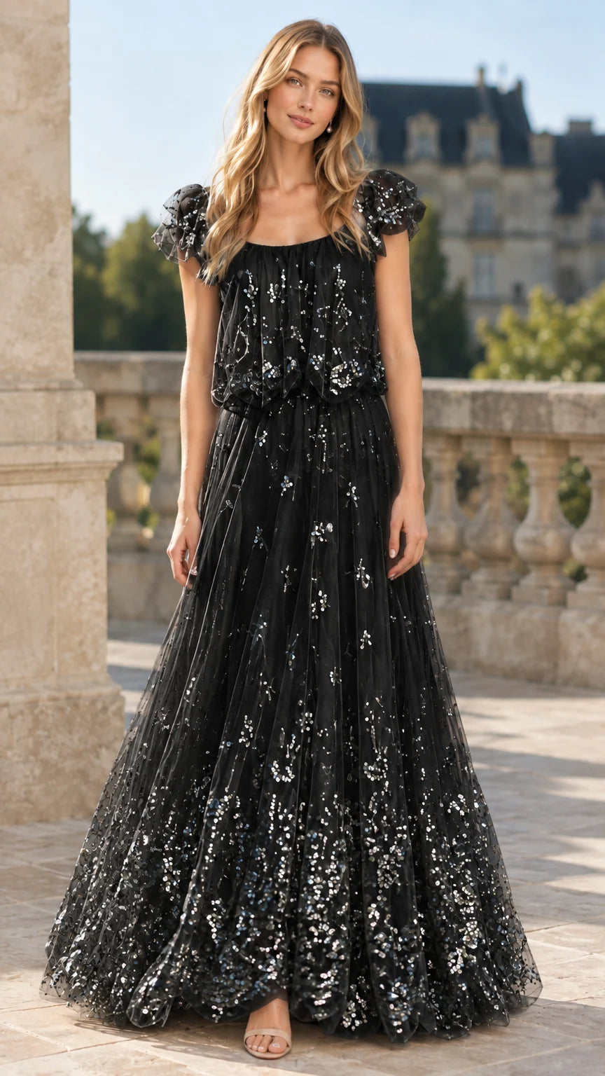 Black sequin embellished flutter sleeve tulle formal evening gown