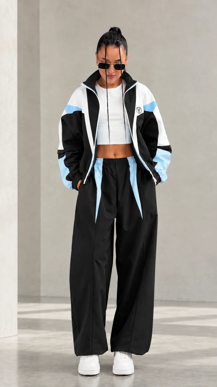 Model wearing Black and light blue colorblock tracksuit set