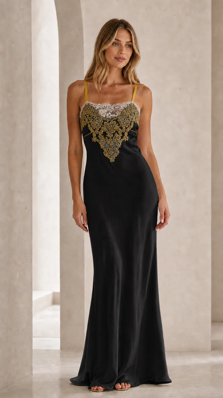 Front view of black satin slip maxi dress with embroidered bodice
