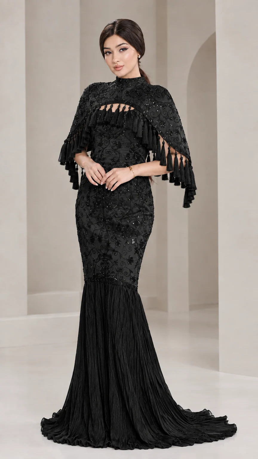 Front view of model wearing Black sequined cape mermaid formal evening gown