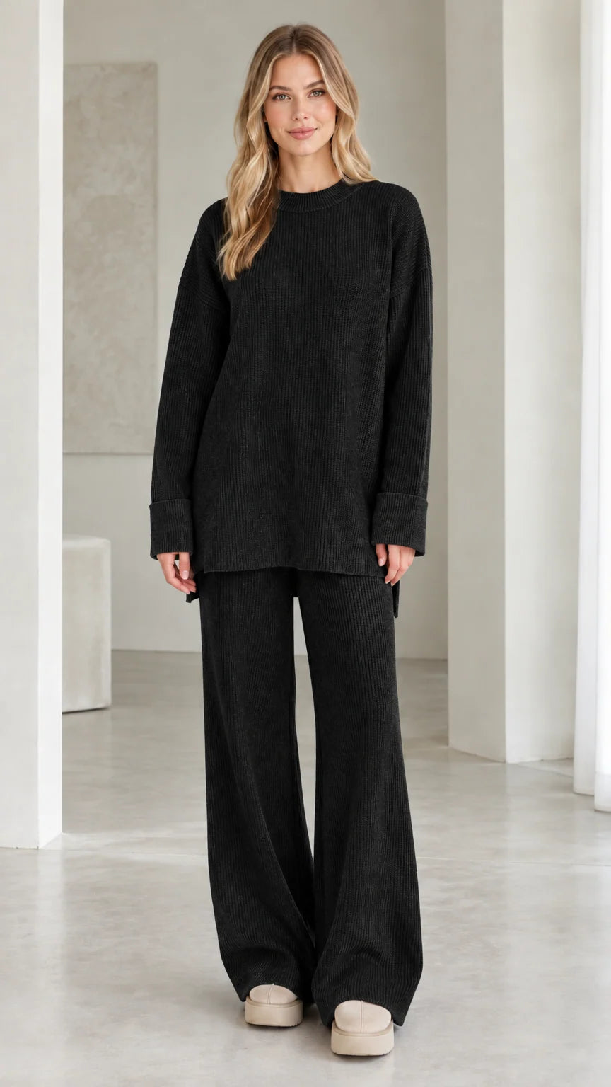 Model wearing black ribbed knit two-piece lounge set