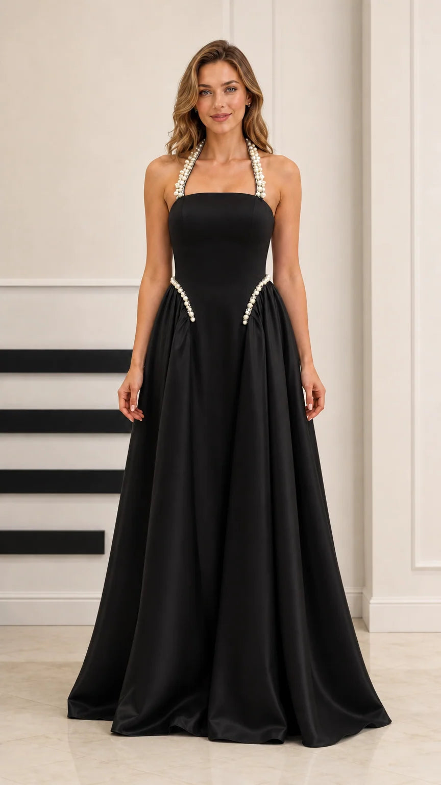 Black satin halter A-line evening gown with pearl embellishments