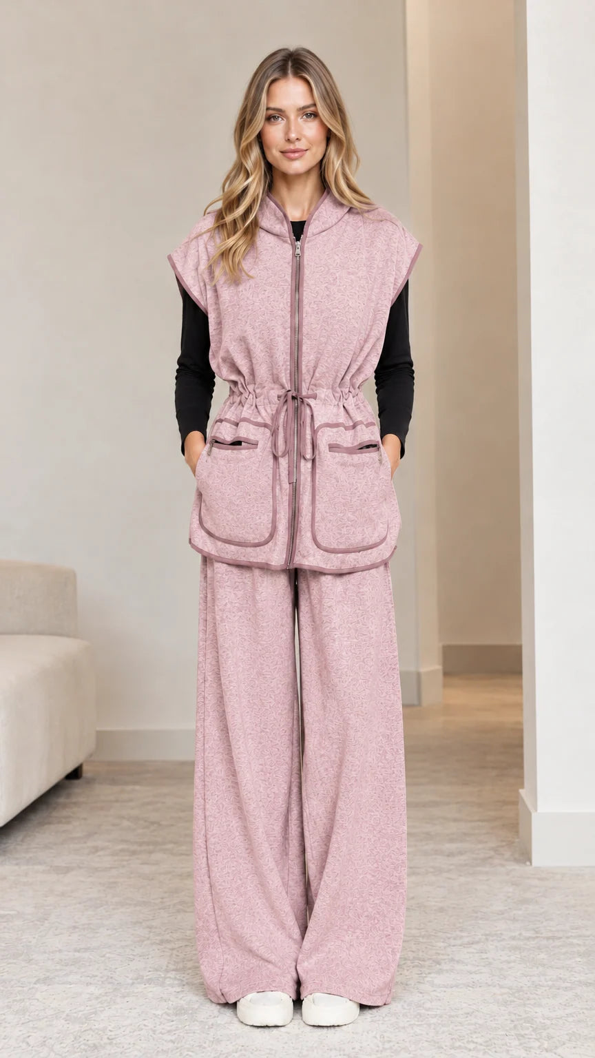 Model wearing dusty pink 2-piece hooded vest and wide-leg pants set