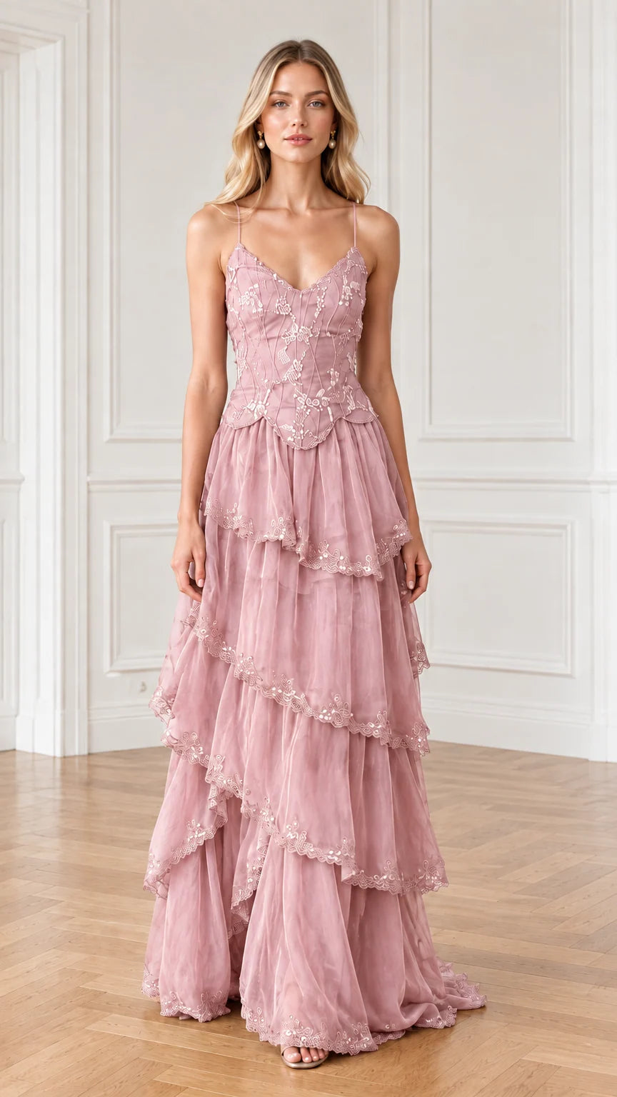 Full-length front view of dusty pink floral embroidered tiered gown