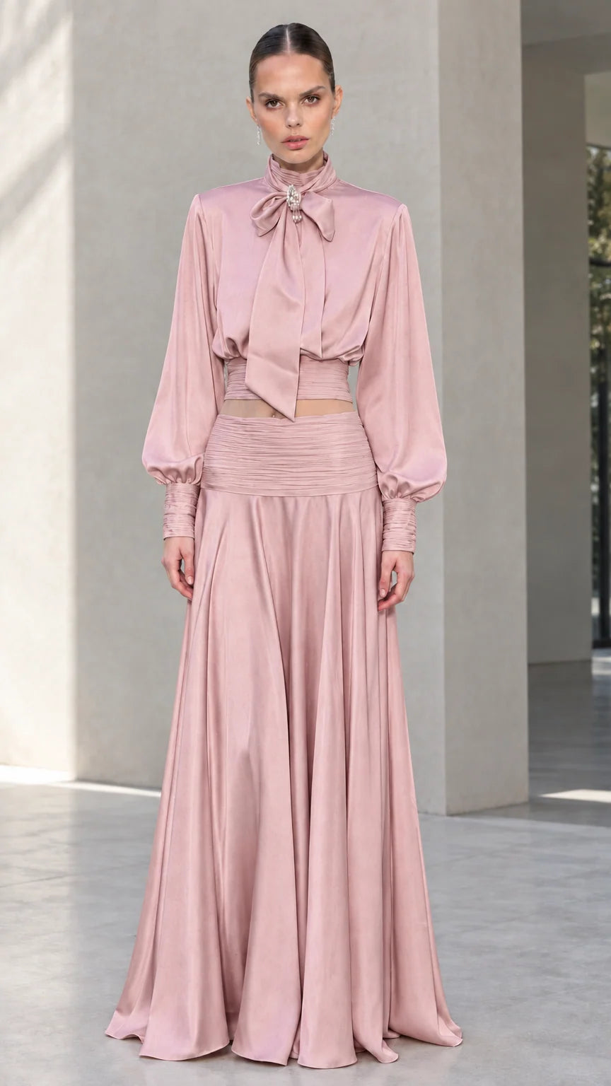 Full-length front view of blush pink satin bow tie blouse and maxi skirt set