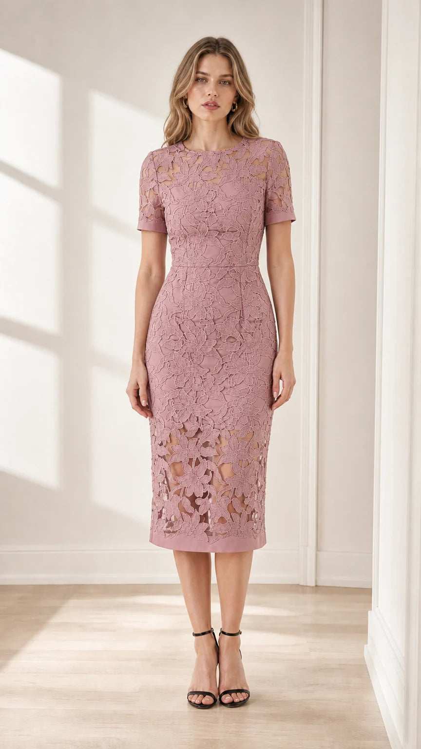 Front view of model wearing dusty pink floral lace midi dress
