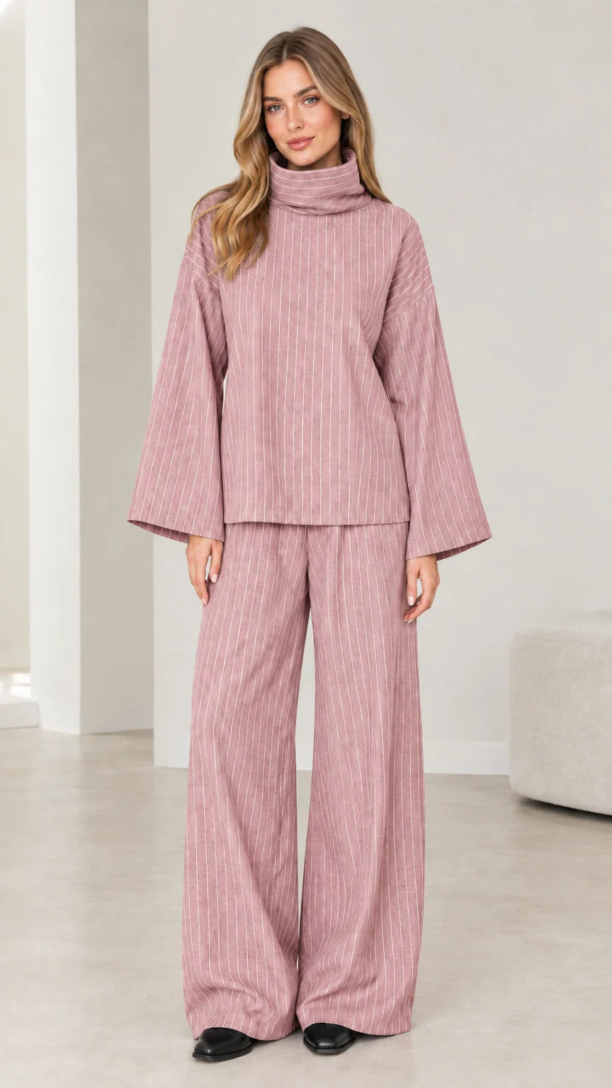 Woman wearing Dusty Pink pinstripe turtleneck and wide-leg pants two-piece set