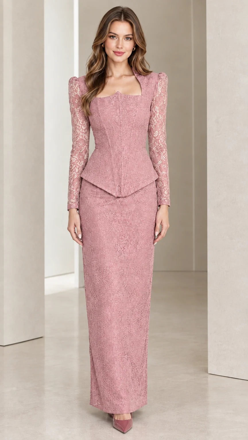 Front view of model wearing dusty pink lace peplum maxi dress set