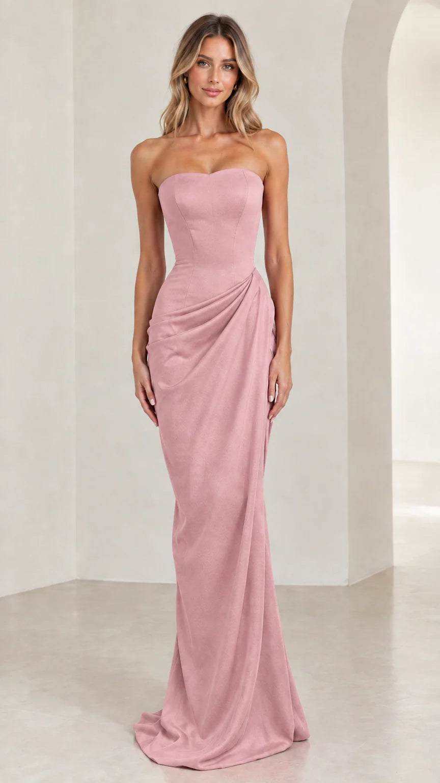 Model wearing dusty pink strapless sweetheart column evening gown