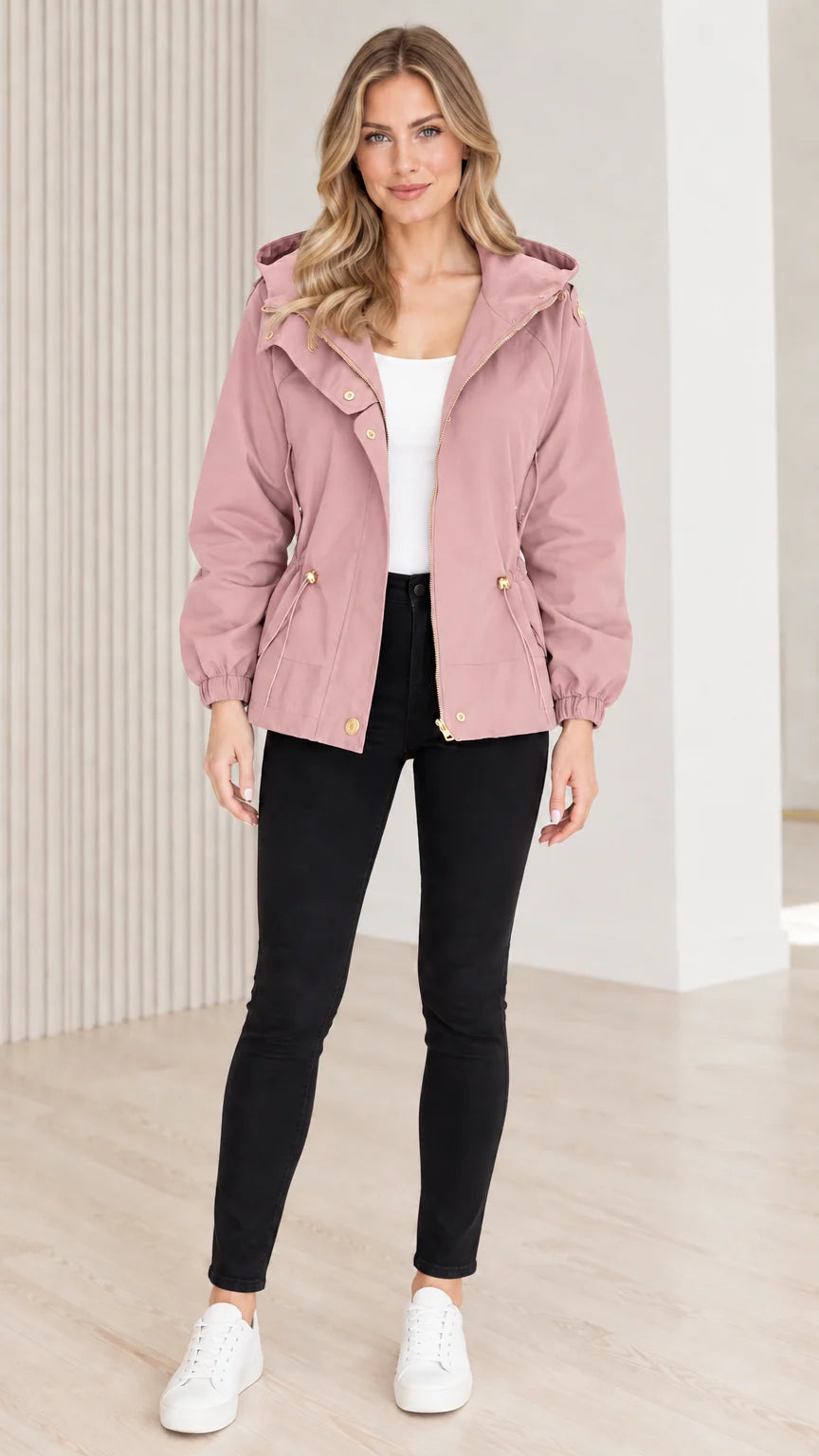 Front view of model wearing dusty pink hooded drawstring utility jacket