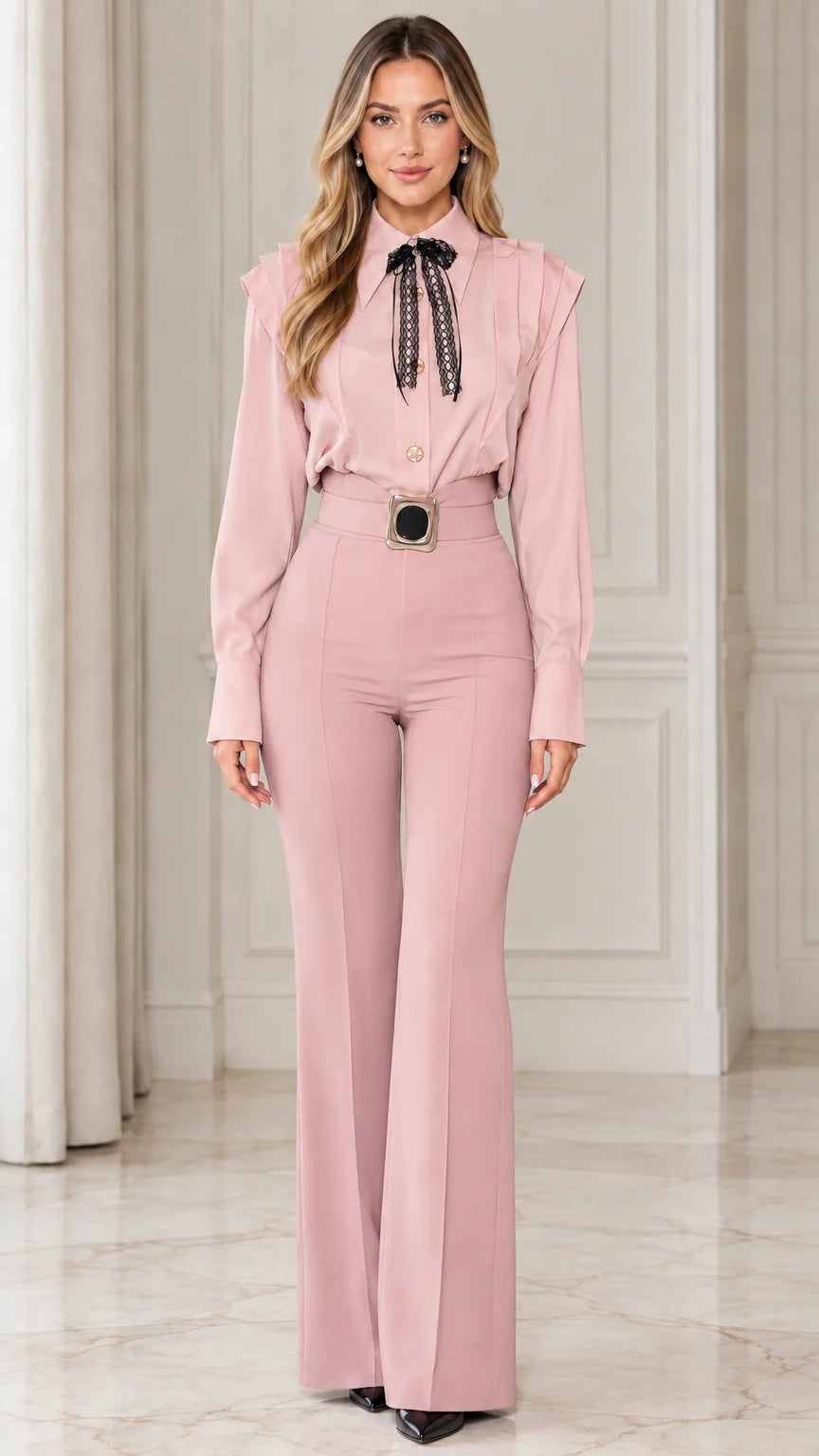 Model wearing dusty pink monochrome long sleeve flare jumpsuit