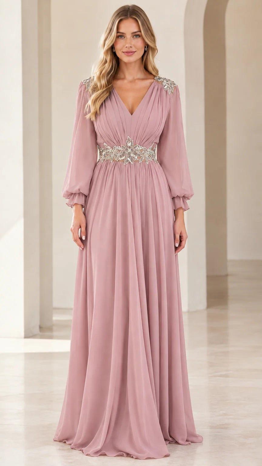 Front view of woman wearing dusty rose chiffon evening gown with long sleeves and beaded waist