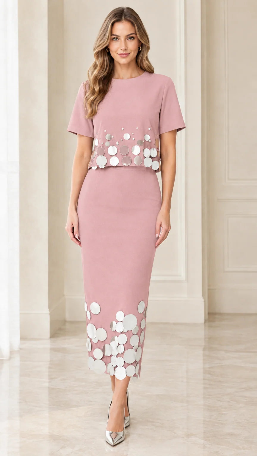 Front view of dusty pink short-sleeve midi dress with silver disc trim