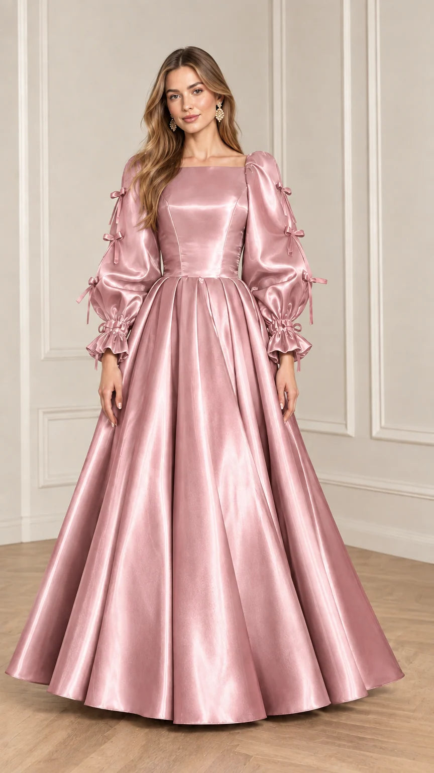 Full-length front view of model wearing Rose Pink satin puff sleeve ball gown