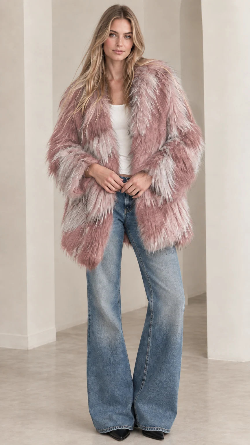 Model wearing dusty pink and grey chevron shaggy faux fur coat