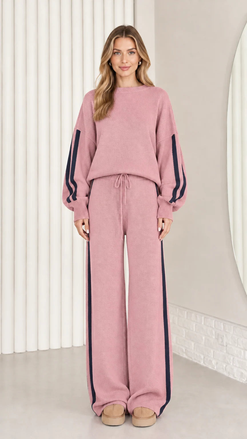 Front view of model wearing dusty pink knit two-piece lounge set with navy stripes