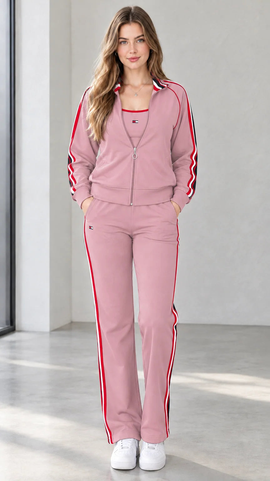 Front view of woman wearing dusty pink contrast stripe track jacket and pants set