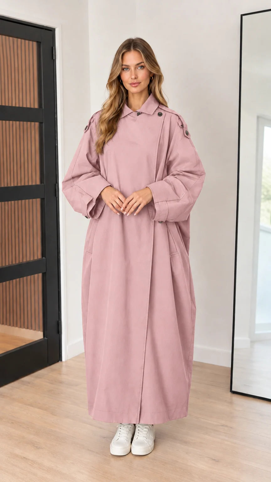 Full-length front view of dusty pink longline trench duster coat on model