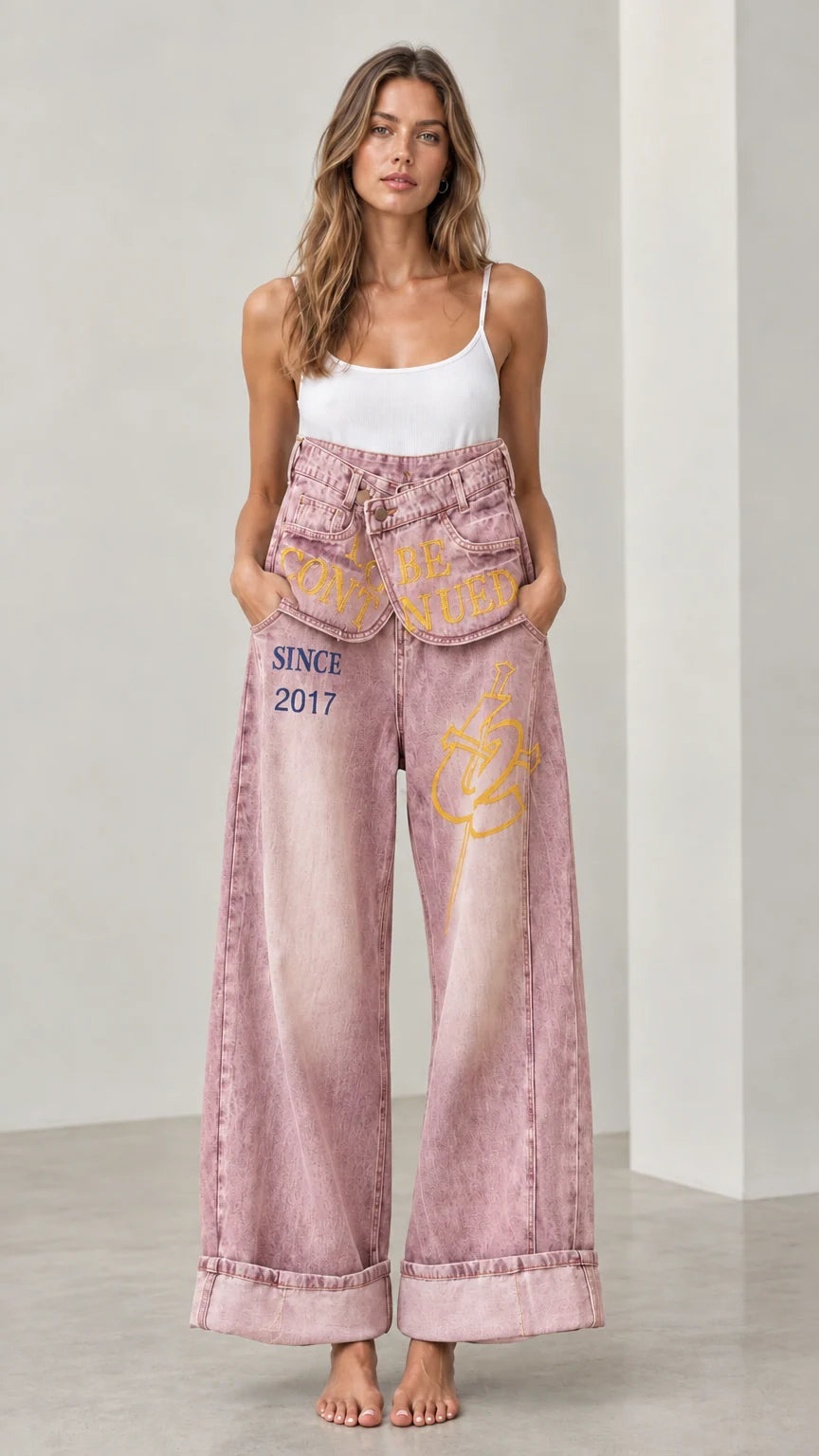 Front full view of Dusty Pink Fold-Over Waist Graphic Wide-Leg Jeans