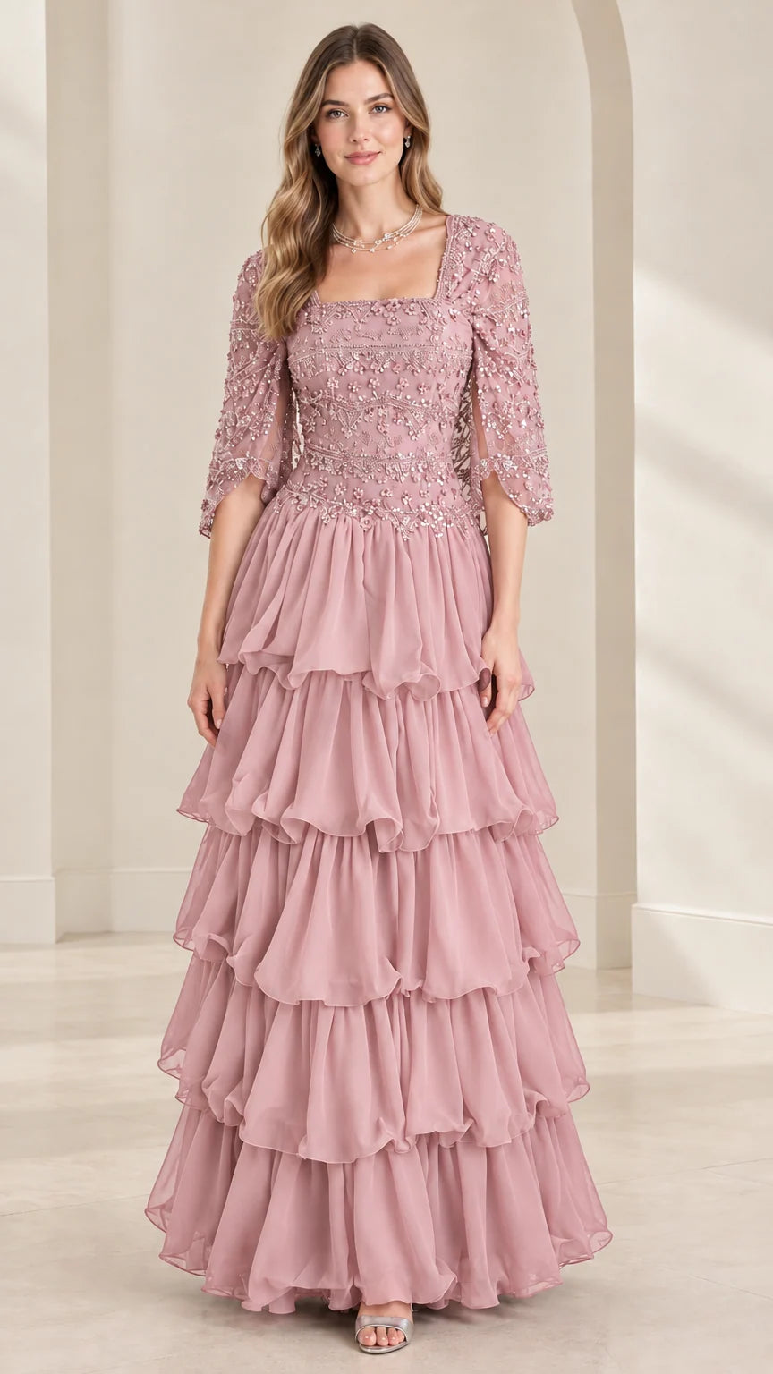 Full view of dusty rose pink sequin beaded tiered ruffle formal evening gown