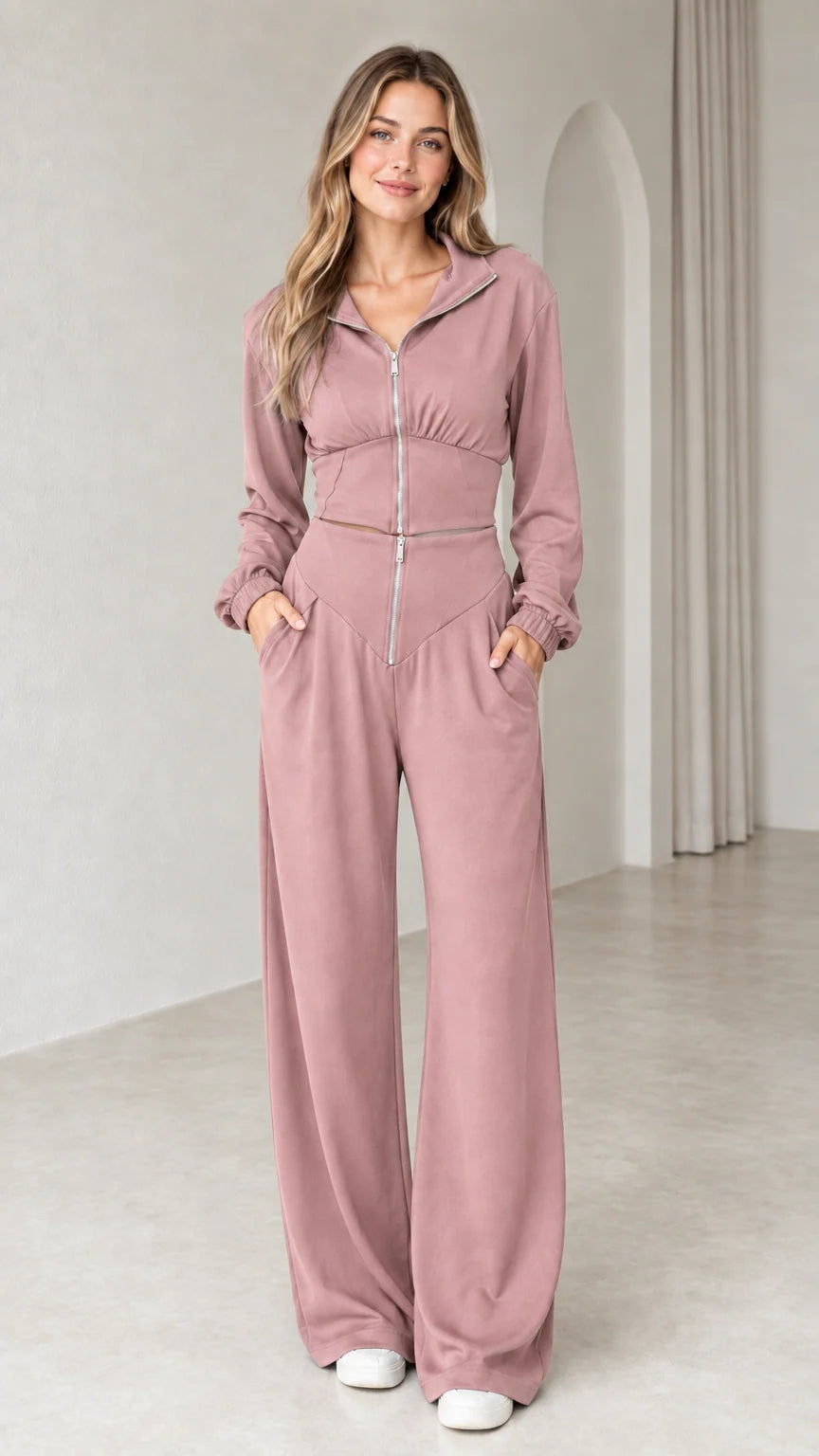 Front view of woman wearing dusty rose pink zip-up collared wide-leg pants set