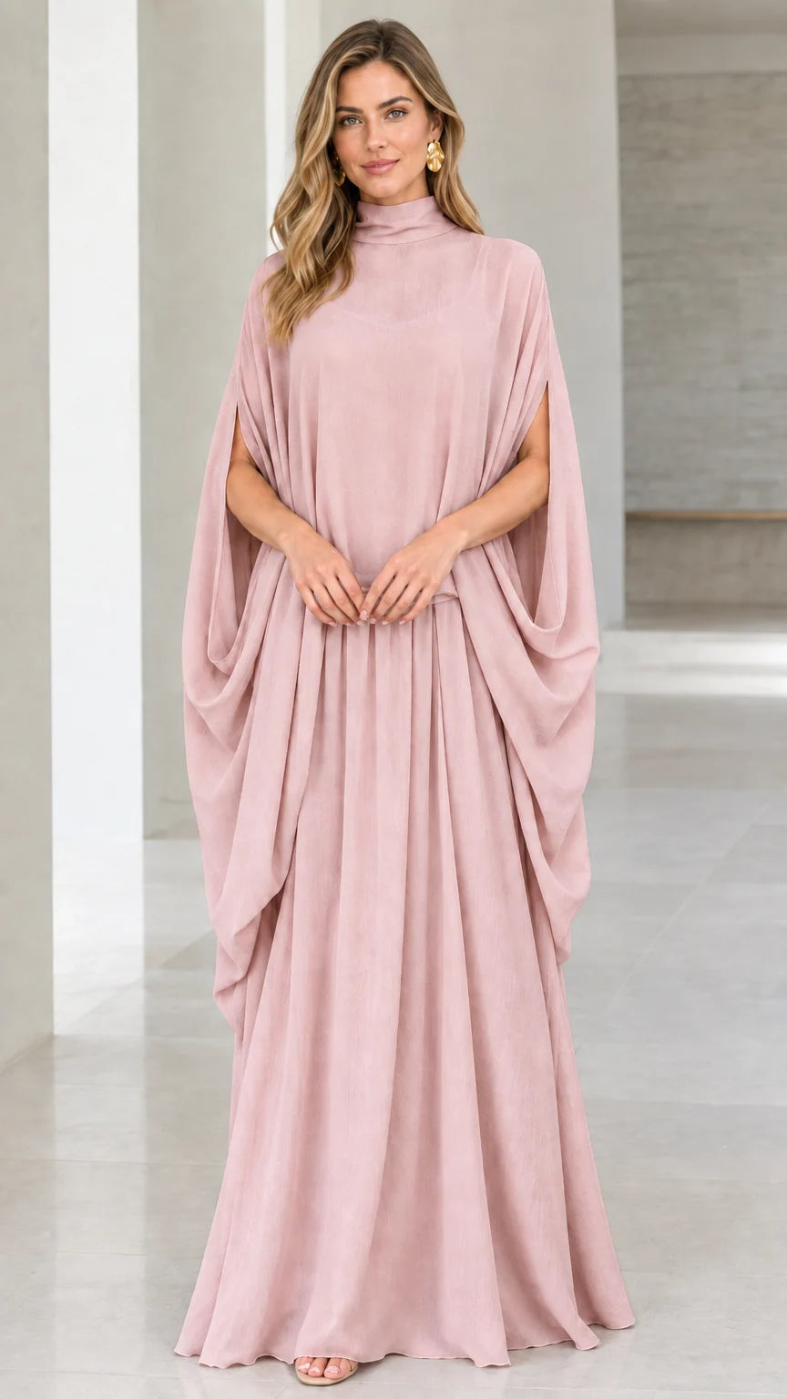Front view of model wearing dusty pink high neck cape sleeve maxi dress