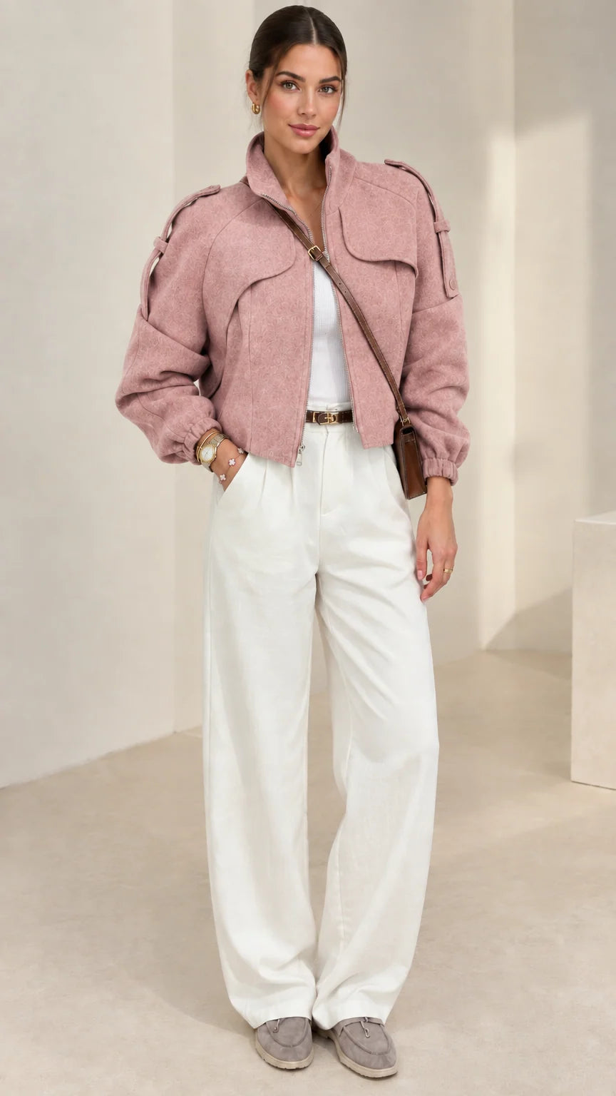 Dusty pink cropped zip-up utility jacket styled with white high-rise trousers