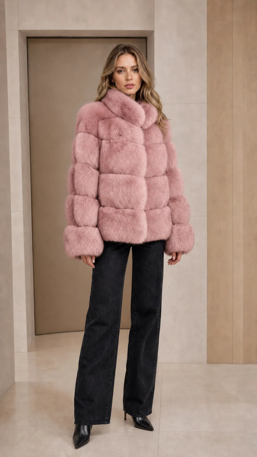 Model wearing dusty pink paneled faux fur winter coat