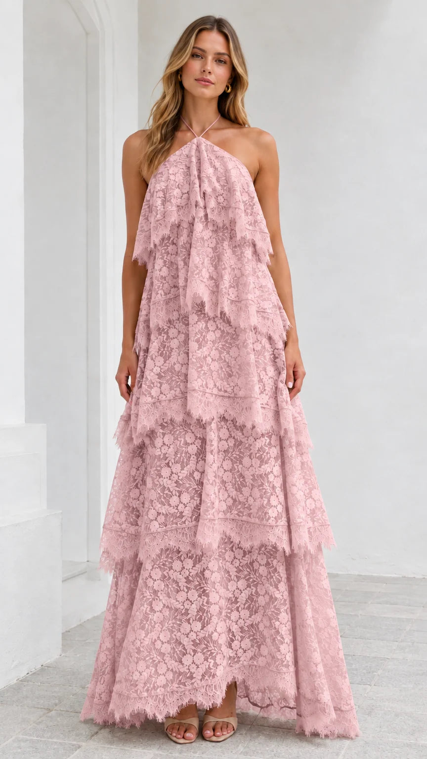 Full-length view of model wearing Blush Pink tiered floral lace halter dress