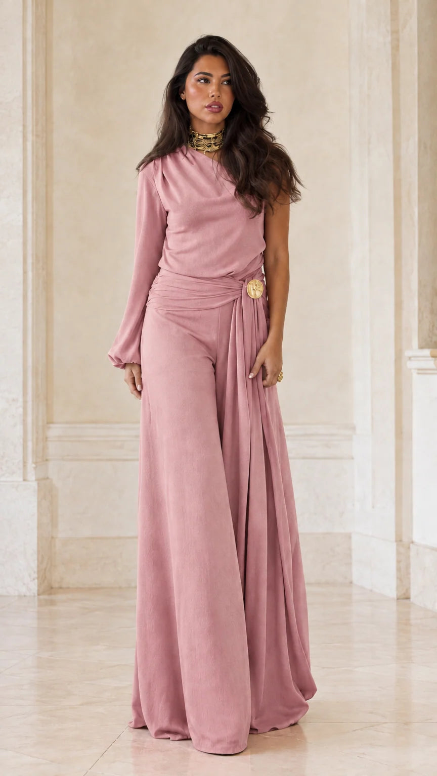 Full-length studio shot of dusty pink one-shoulder wide-leg evening jumpsuit