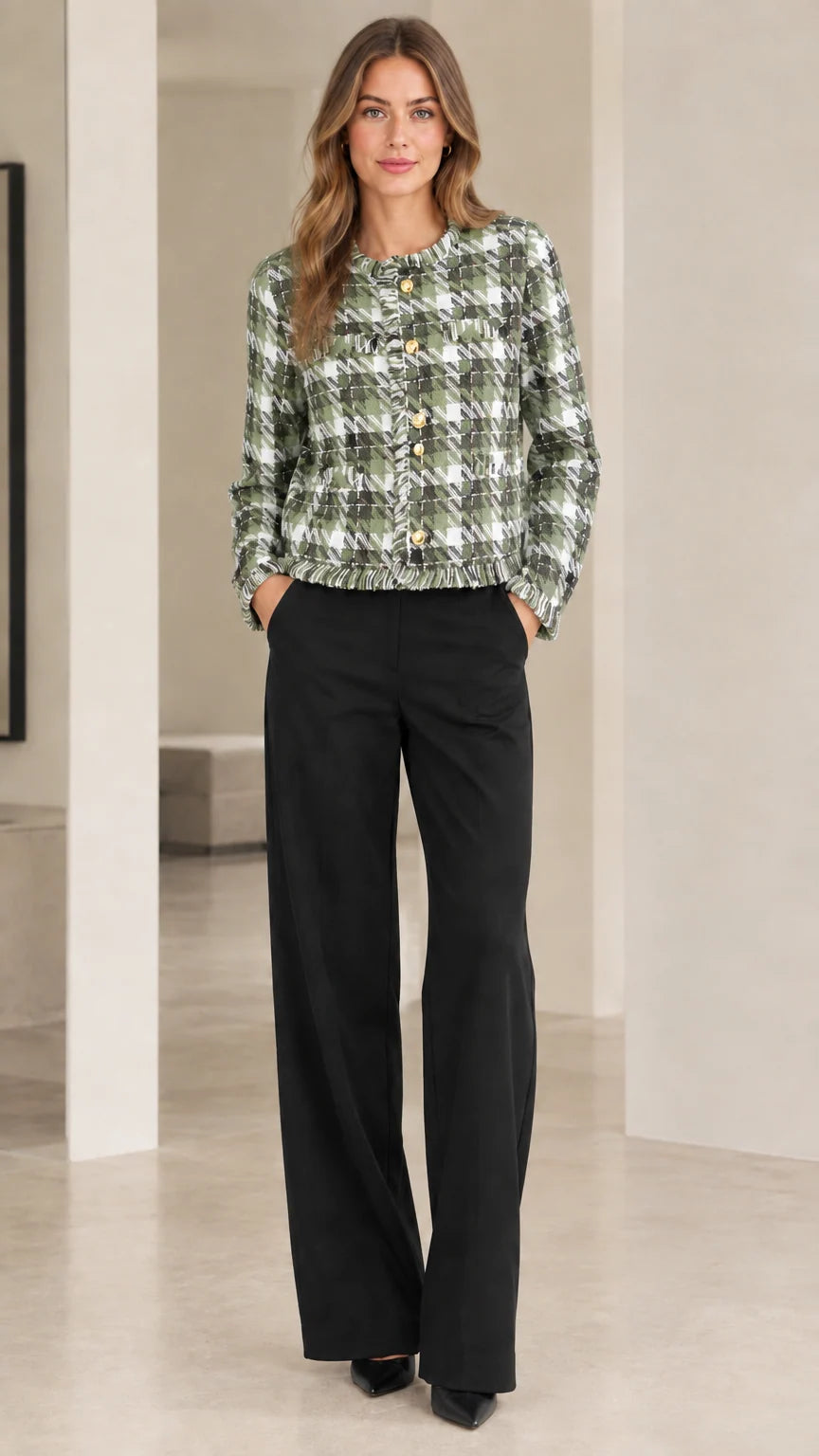 Model wearing sage green and white plaid tweed cropped jacket