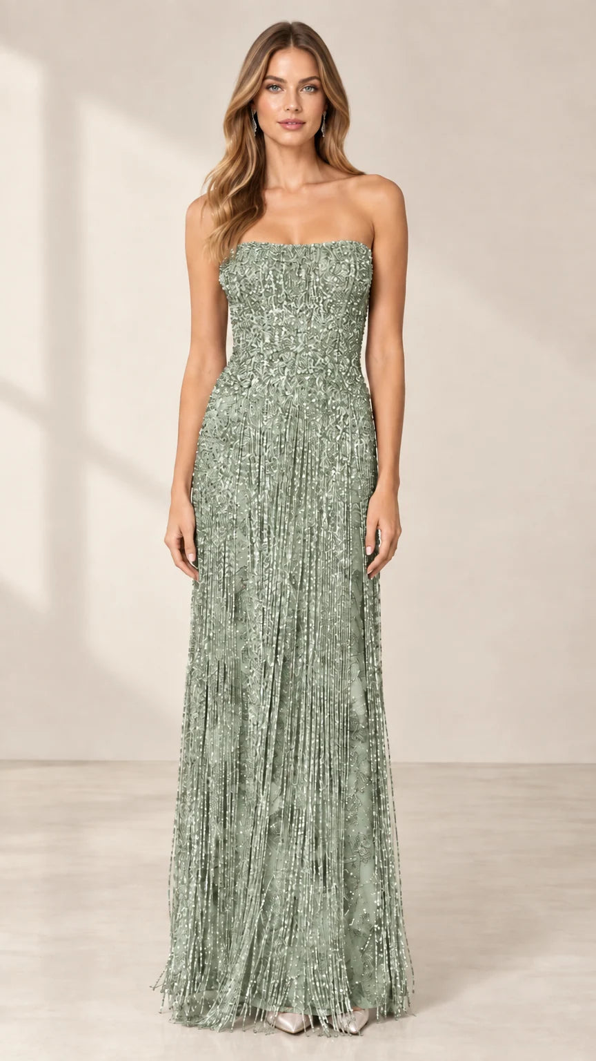 Front view of model wearing sage green strapless beaded fringe evening gown