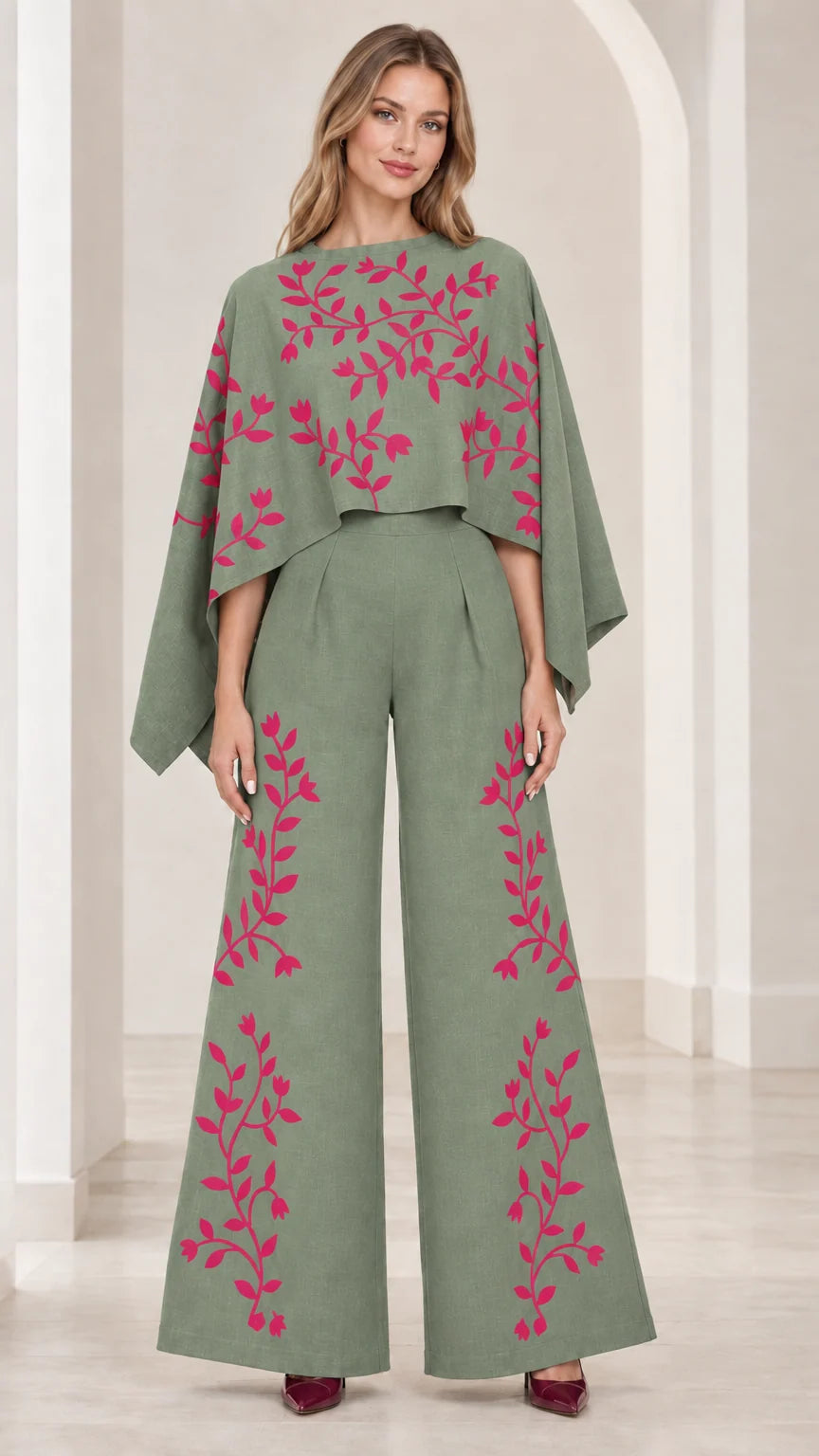 Front view of sage green embroidered cape sleeve wide leg jumpsuit