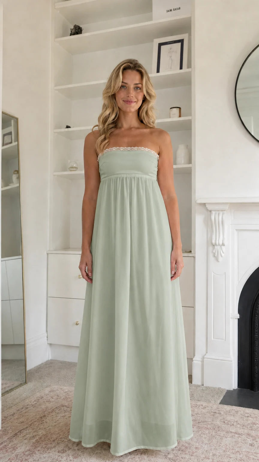 Woman wearing sage green strapless maxi dress