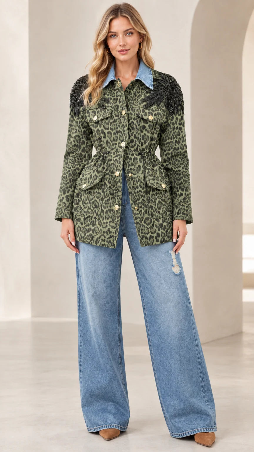 Model wearing olive green leopard print jacket with contrast denim collar
