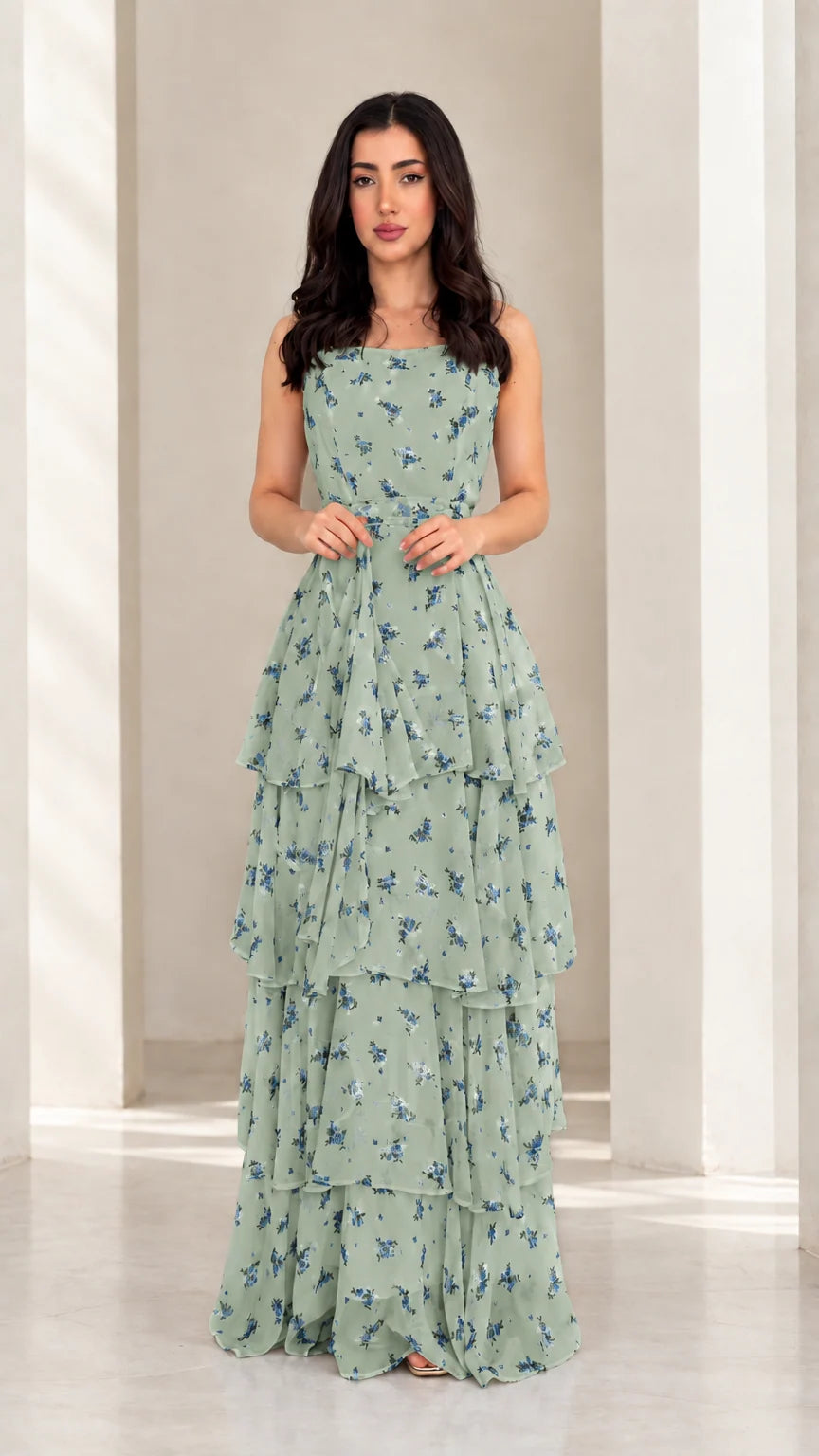 Model wearing sage green floral tiered ruffle maxi dress
