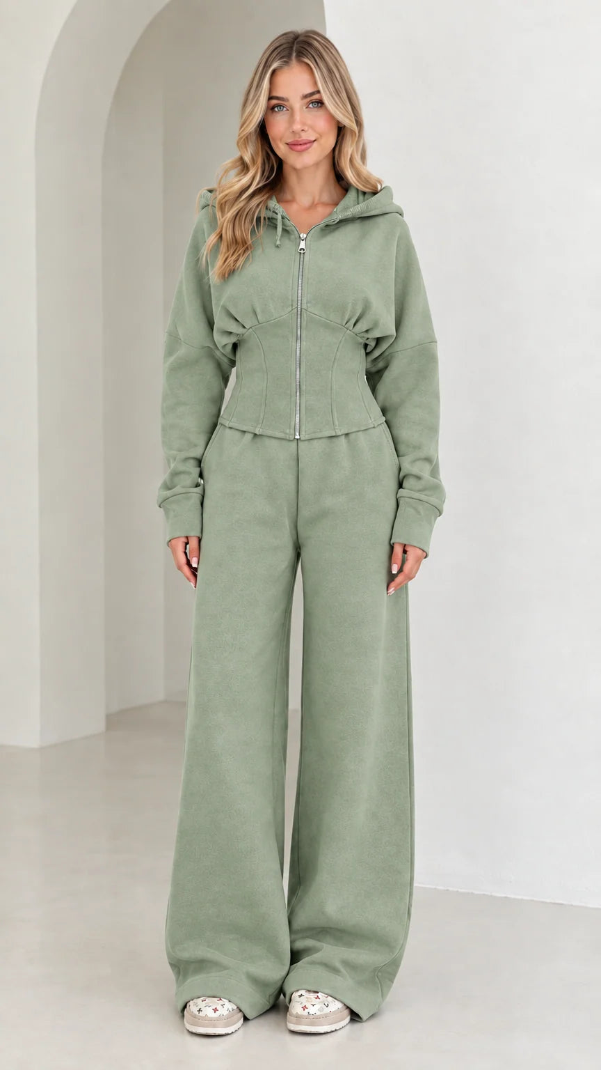 Full-length view of women's corset hoodie and wide-leg sweatpants set in Sage Green
