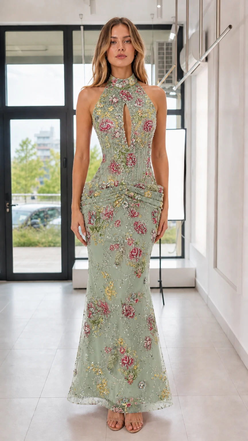 Model wearing sage green floral sequin evening gown