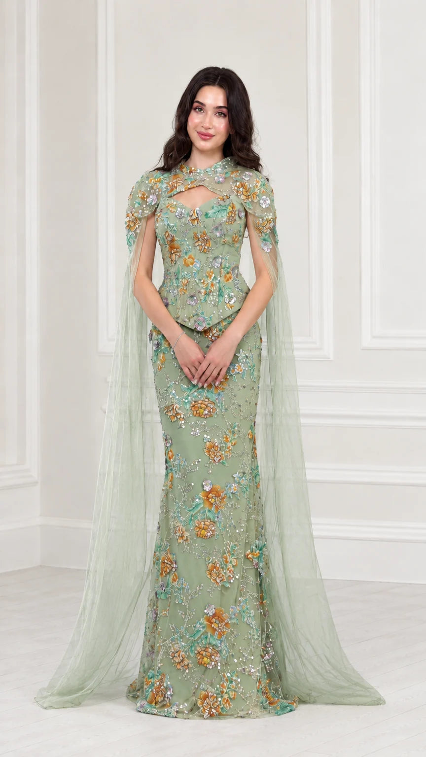 Front view of Sage Green floral embroidered evening gown with sheer green cape