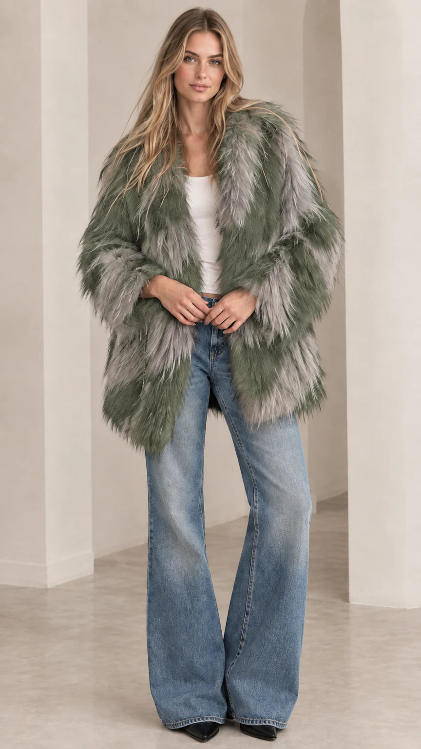Model wearing sage green and grey chevron shaggy faux fur coat