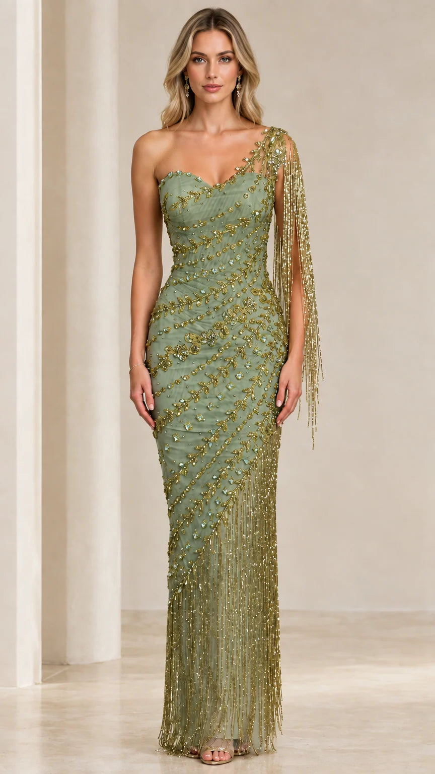 Front view of model wearing Sage Green and gold one-shoulder beaded fringe evening gown