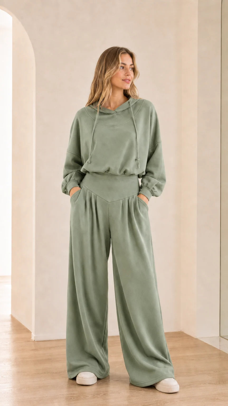 Full-body view of model wearing sage green 2-piece wide-leg hoodie set