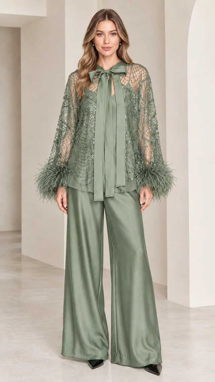Sage green beaded bow top and matching wide-leg trousers