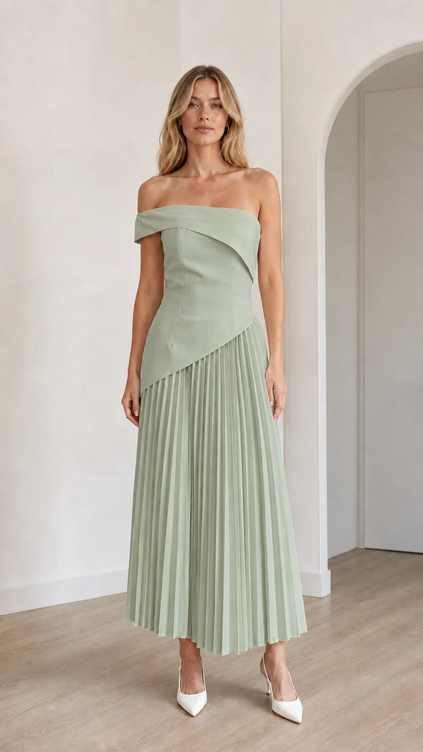 Model wearing sage green off-shoulder asymmetric pleated midi dress