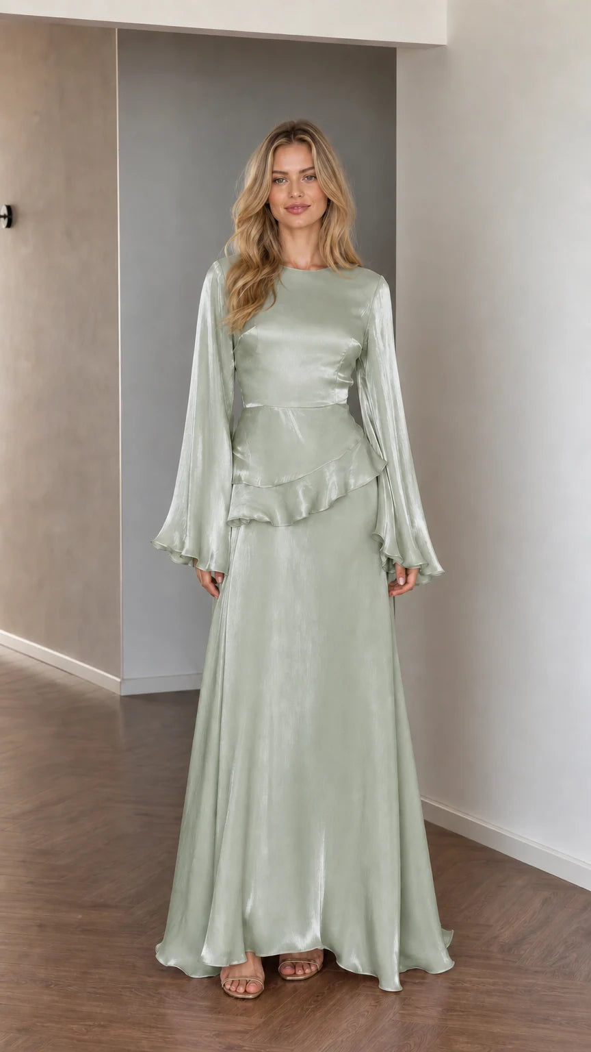 Front view of model wearing sage green satin long sleeve maxi dress