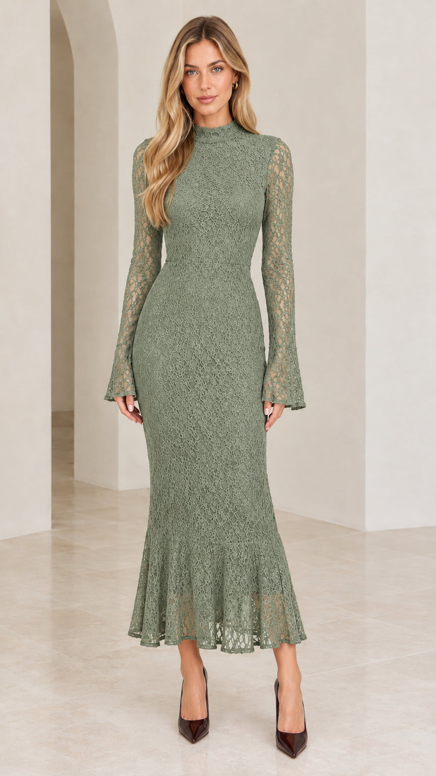 Front view of woman wearing sage green lace mock neck long sleeve mermaid dress
