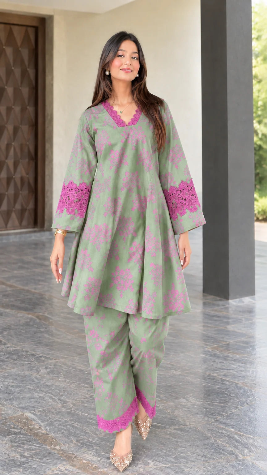 Front view of sage green floral print two-piece tunic and pant set