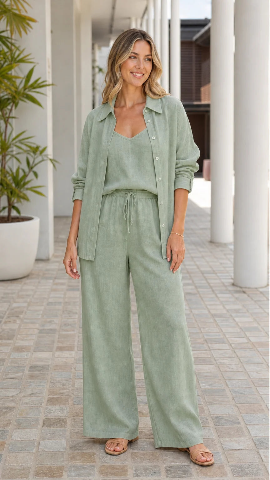 Woman wearing sage green 3-piece linen outfit