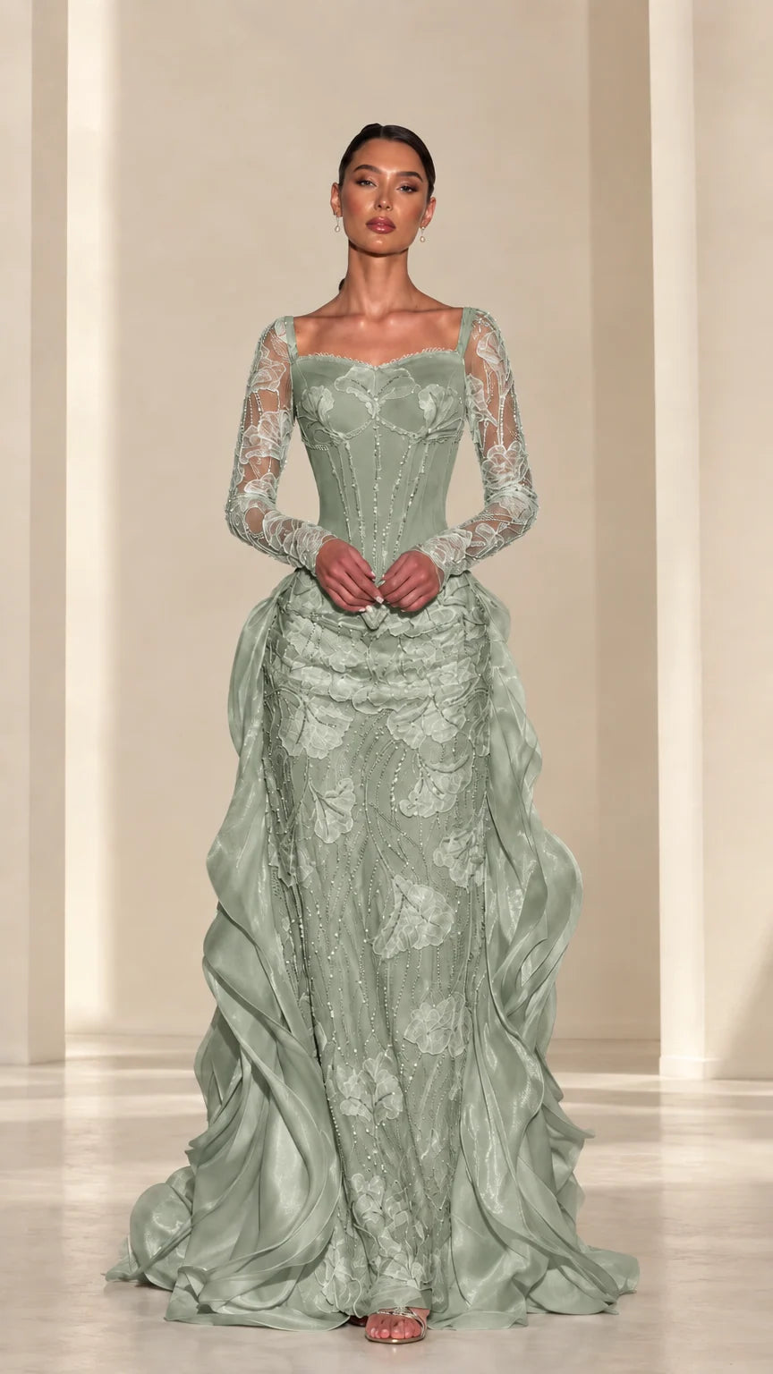 Front view of sage green embroidered corset gown with sheer sleeves